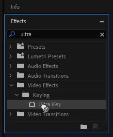 apply the ultra key effect to the green screen video clip